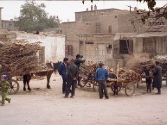 11 Kashgar Old City Street Scene 1993 Donkey Carts Being Loaded With Wood